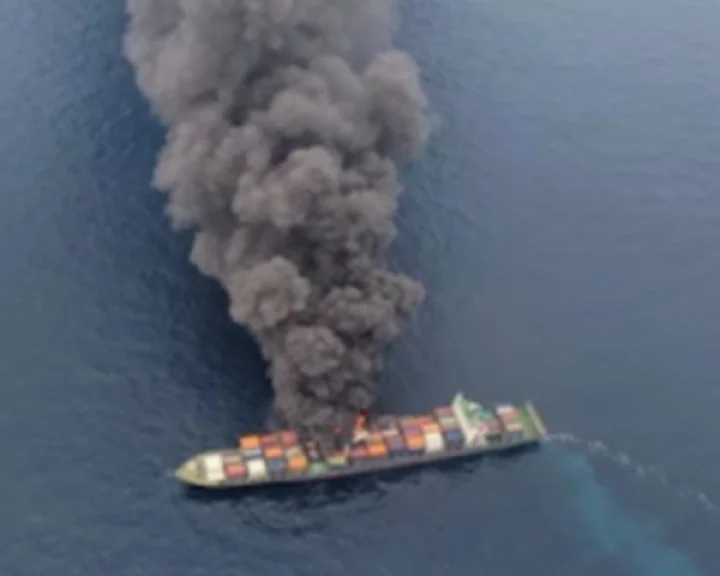 Fire hit Singaporean ship towed away from beach