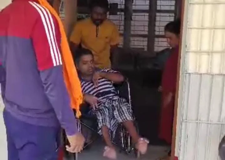 A young man came and voted in a wheel chair