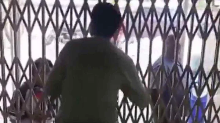 Bank manager locks door
