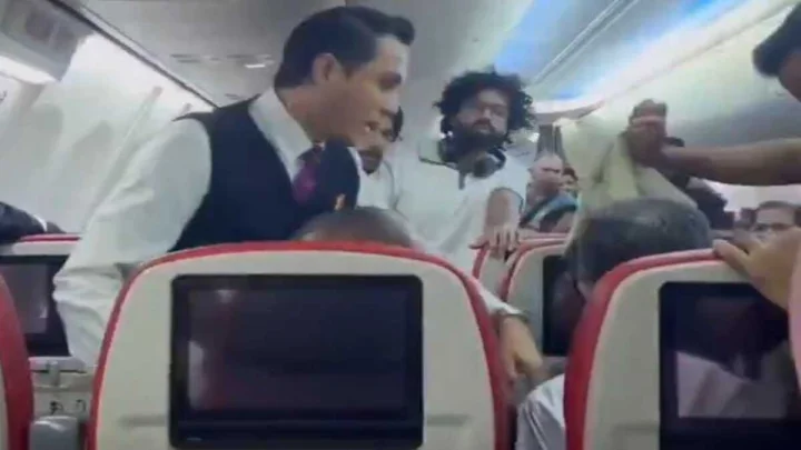 Kerala man opens flight emergency door
