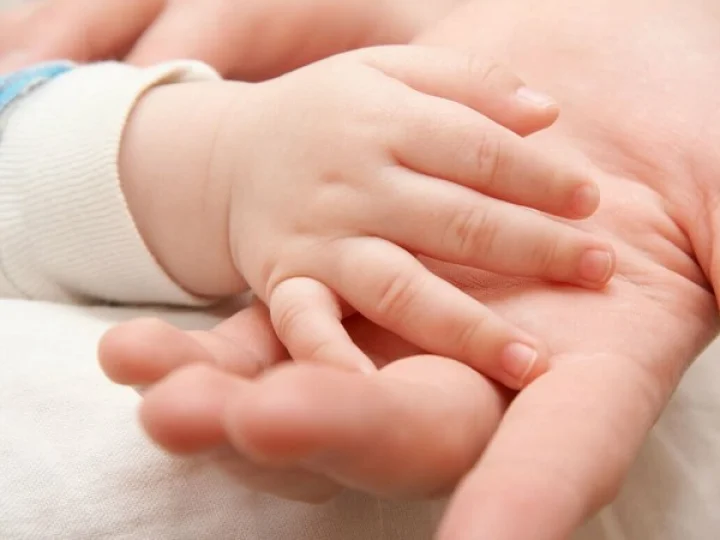 a woman gave birth to three baby