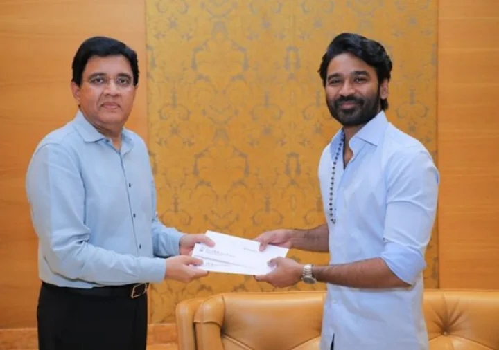Mr. Kalanithi Maran congratulated @dhanushkraja for the grand success of Raayan and presented 2 cheques to him one for the hero and one for the director