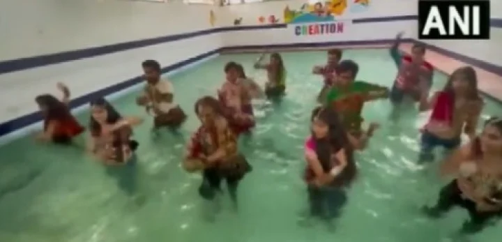 Women were seen doing garba in swimming pools in udaypur