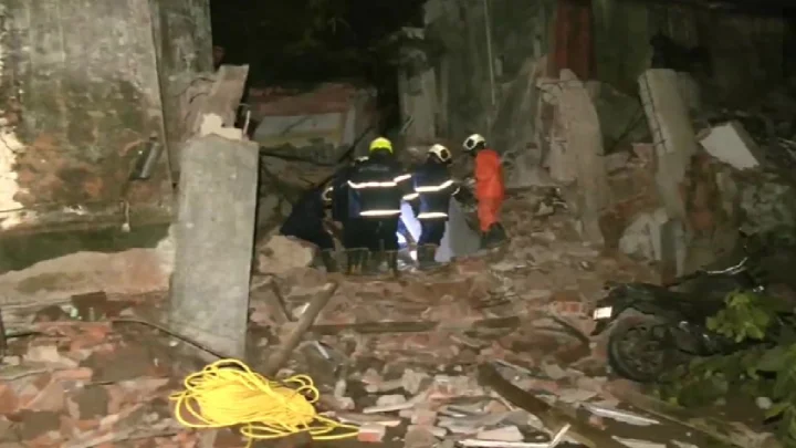 Building wall collapses in Thane
