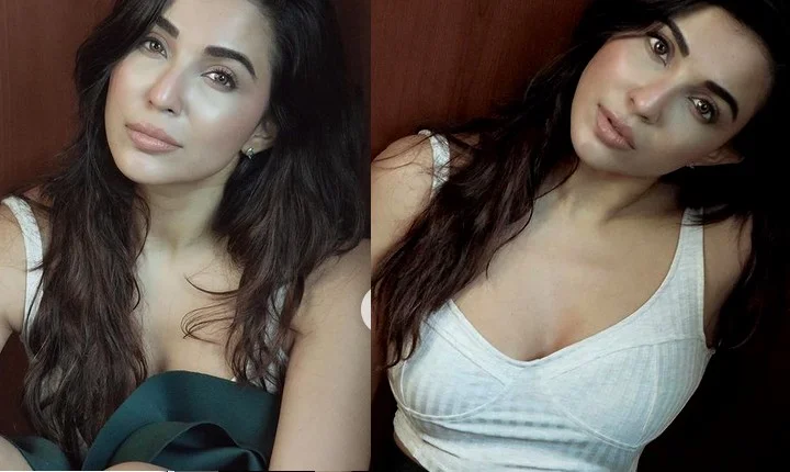 வெள்ளை உடையில் பளபளன்னு மேனி காட்டிய பார்வதி நாயர்!