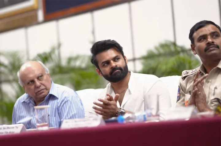 Sai tej with police officers