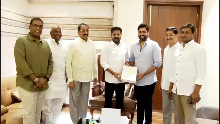 Nara Rohit  presenting wedding card to Revanth Reddy